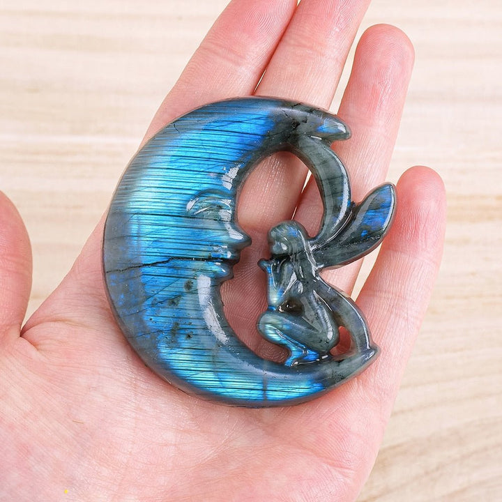 Carved Labradorite Fairy on Moon - Invite Magic, Mystery, and Protection into Your Life with This Enchanting Crystal Sculpture - Light Of Twelve
